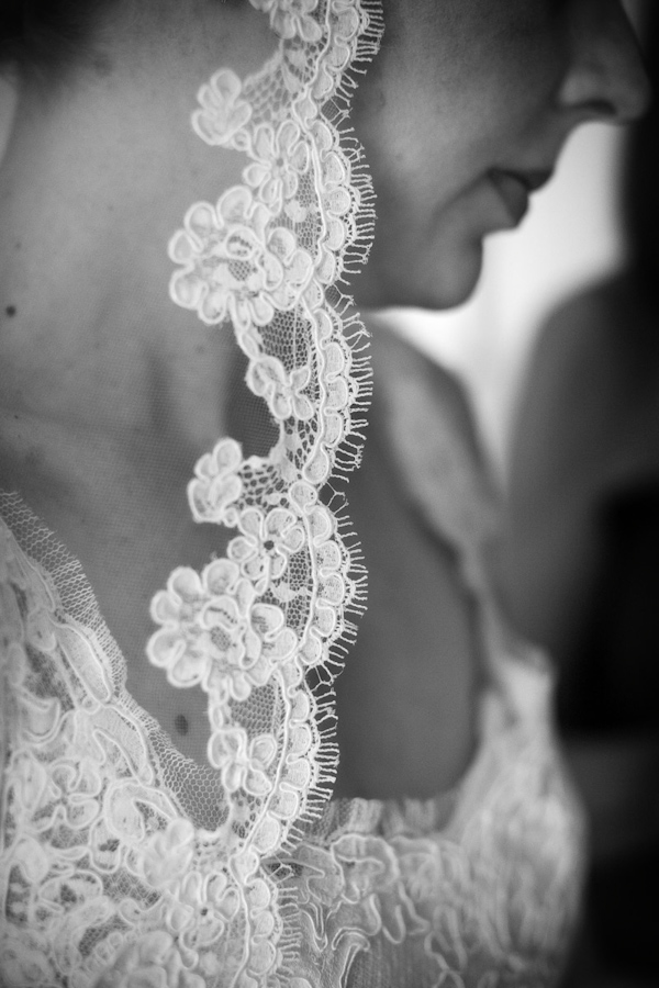black and white photo of the details of the bride's mantilla style wedding veil - photo by Washington DC based wedding photographers Holland Photo Arts